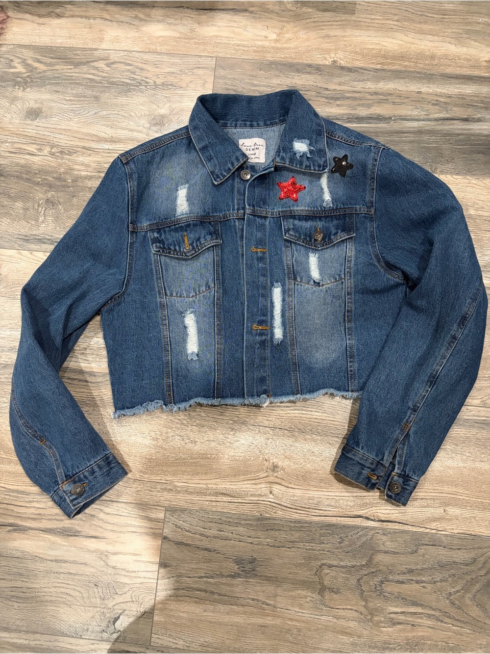 Love Tree Cropped Distressed Denim Jacket with Red & Black Star Patches
